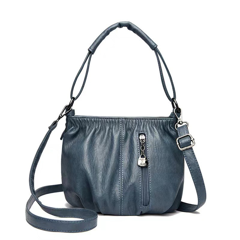 ⏰ Endast nu 50% rabatt!👜✨ Avslappnad veckad väska i mjukt läder ✨ – Praktisk bucket-väska med stil 💼 Lätt, slitstark och perfekt för vardagsbruk! 🌟